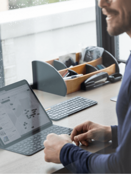 Man looking at map on computer