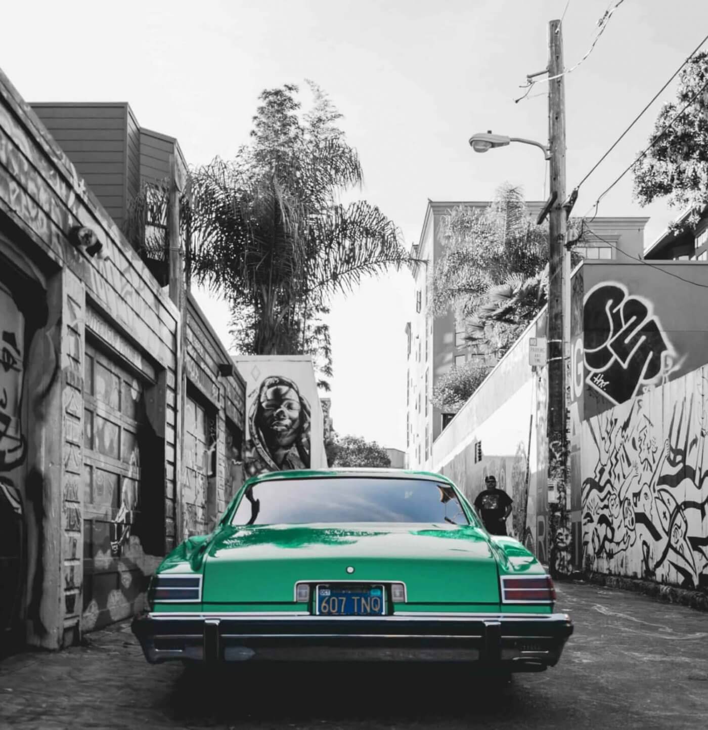 Green car in alley